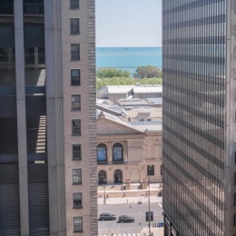 Wake up to views that never get old. a view between two buildings