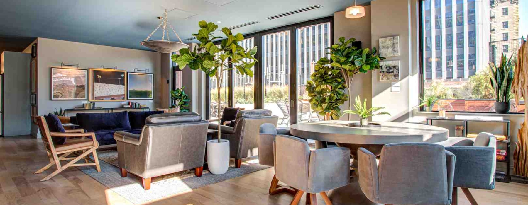 modern luxury apartment interior with high ceilings and large windows - chicago loop luxury apartments