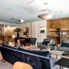 lounge in a bright room with ample seating