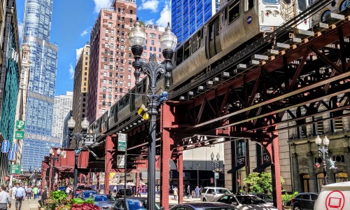 image of train and studio apartments in The Loop Chicago