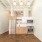 open kitchen with overhead lighting and high ceilings