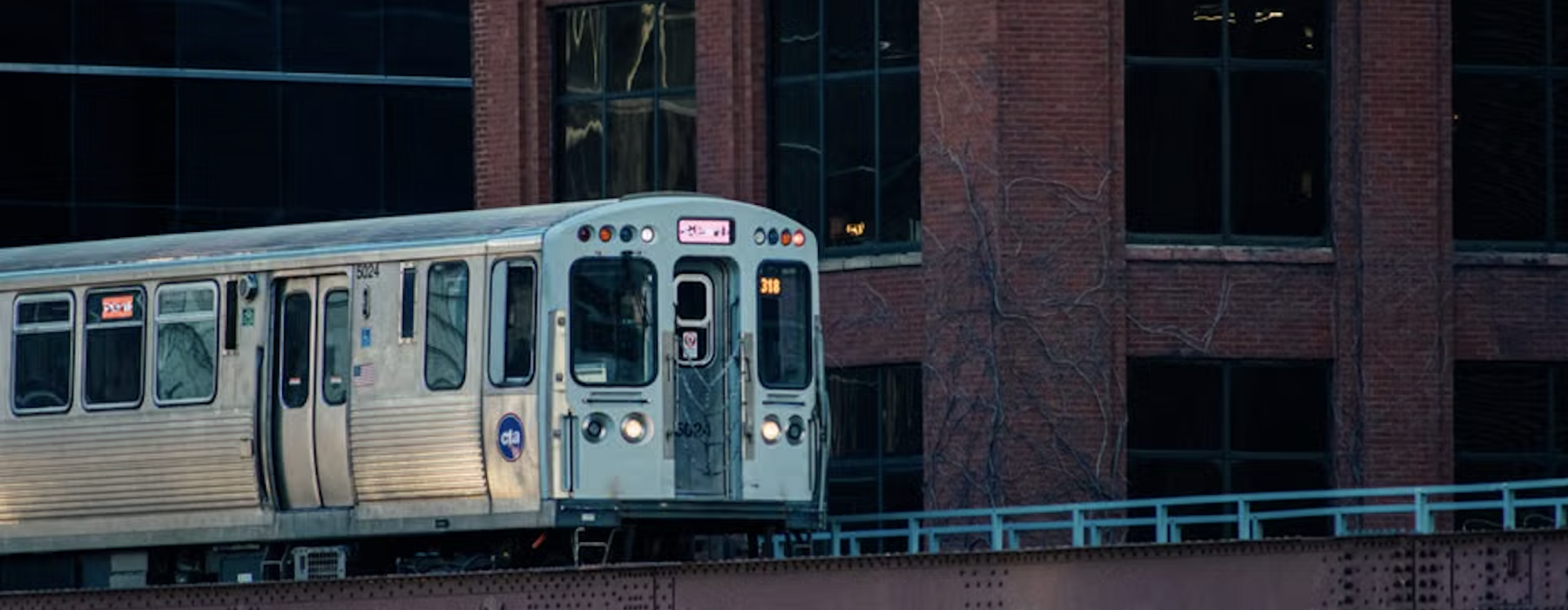 CTA train tracker L train arriving at downtown Chicago station