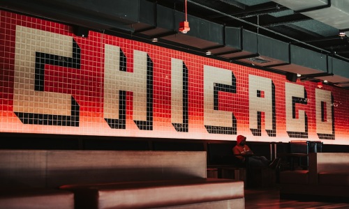 arcade bar in Chicago with people playing games - bar with arcade games chicago