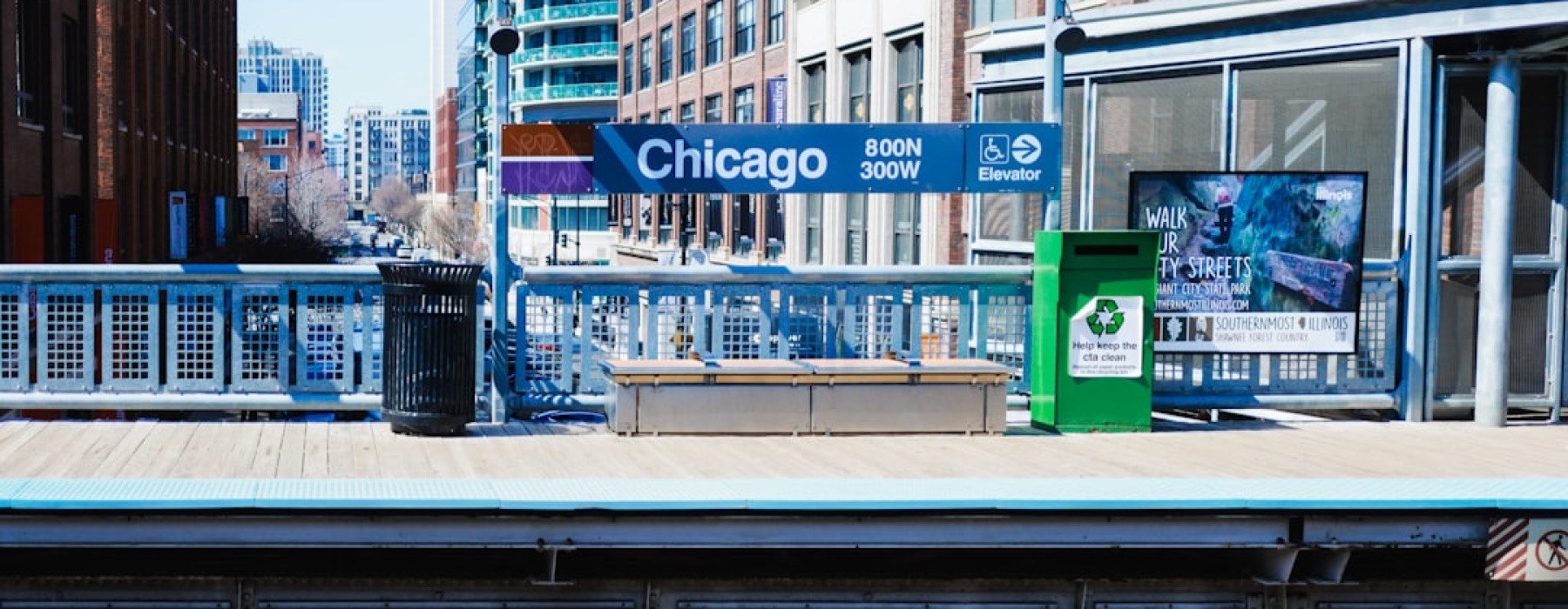 CTA Blue Line train arriving at a station platform